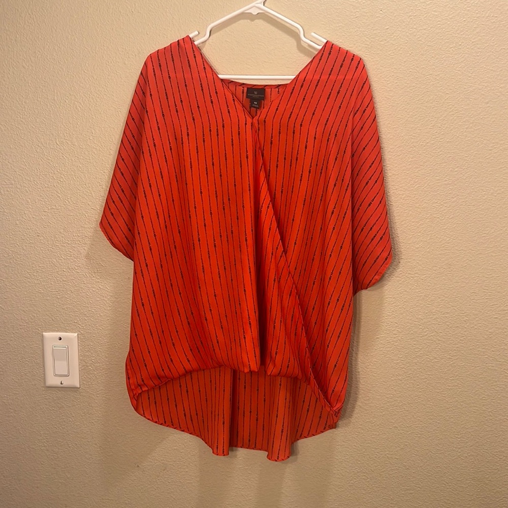 Selling an orange blouse with black accents from Worthington Women in 1x
